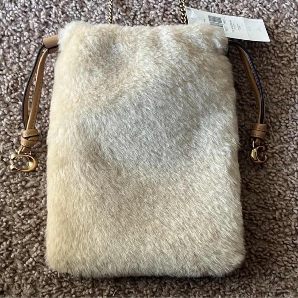 Coach natural shearling mini drawstring crossbody NWT